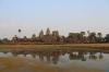 View over the (not so) reflecting pool towards the main temples of Angkor Wat during sunset.