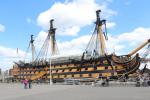HMS Victory is a 104-gun first-rate ship of the line of the Royal Navy, ordered in 1758, laid down in 1759 and launched in 1765. She is best known as Lord Nelson's flagship at the Battle of Trafalgar in 1805. In 1922, she was moved to a dry dock at Portsmouth, England, and preserved as a museum ship. She is the flagship of the First Sea Lord since October 2012 and is the world's oldest naval ship still in commission.
