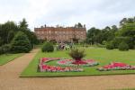 Hughenden Manor is a red brick Victorian mansion. View from the park behind the house.