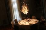 Ingo Maurer's exploding porcelain chandelier, Porca Miseria, in the Blue Dining Room
