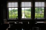 View through windows on the first floor to the formal gardens of Hatfield House