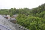 View from the roof terrace on top of New Lanark museum to the water currents of the river Clyde powering the mill.