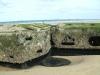 Huge beton block of the former Mulberry Harbour at Arromanches