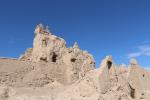 The ruins of Narenj Ghaleh castle almost look like a termite mound made out of adobe