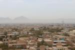 View from castle over the mud-brick desert city of Meybod and the surrounding mountain range